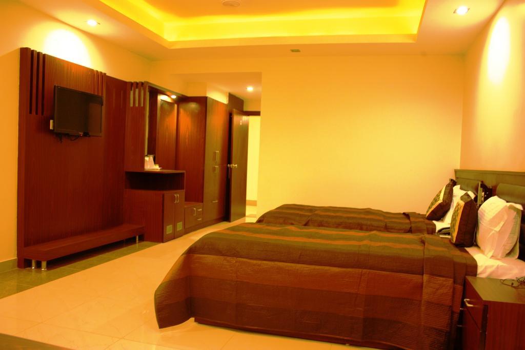 Hotel Avn Grand Ranchi Quarto foto